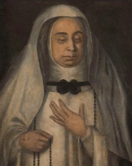 Retrato mortuorio de La Siervita. Viste de monja, con hábito blanco. Tiene la mano sobre el pecho y con la otra sostiene un rosario.